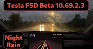 Night / Rain drive with several roundabouts FSD Beta 10.69.2.1